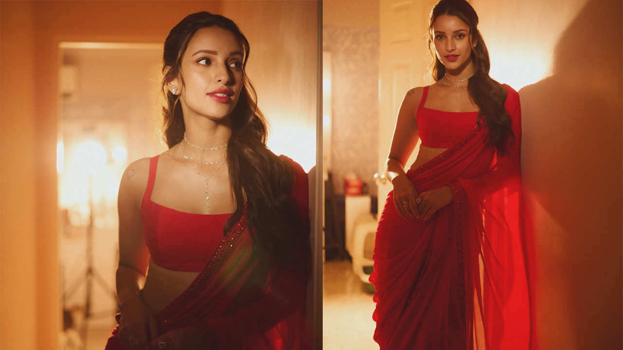 The Mesmerizing Charm of Trupti Dimri in a Red Saree The Mesmerizing Charm of Trupti Dimri in a Red Saree