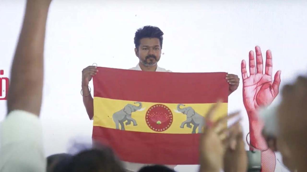 Vijay Unveils Flag of New Political Party 'Tamil Vetri Kazhagam' Vijay Unveils Flag of New Political Party 'Tamil Vetri Kazhagam'
