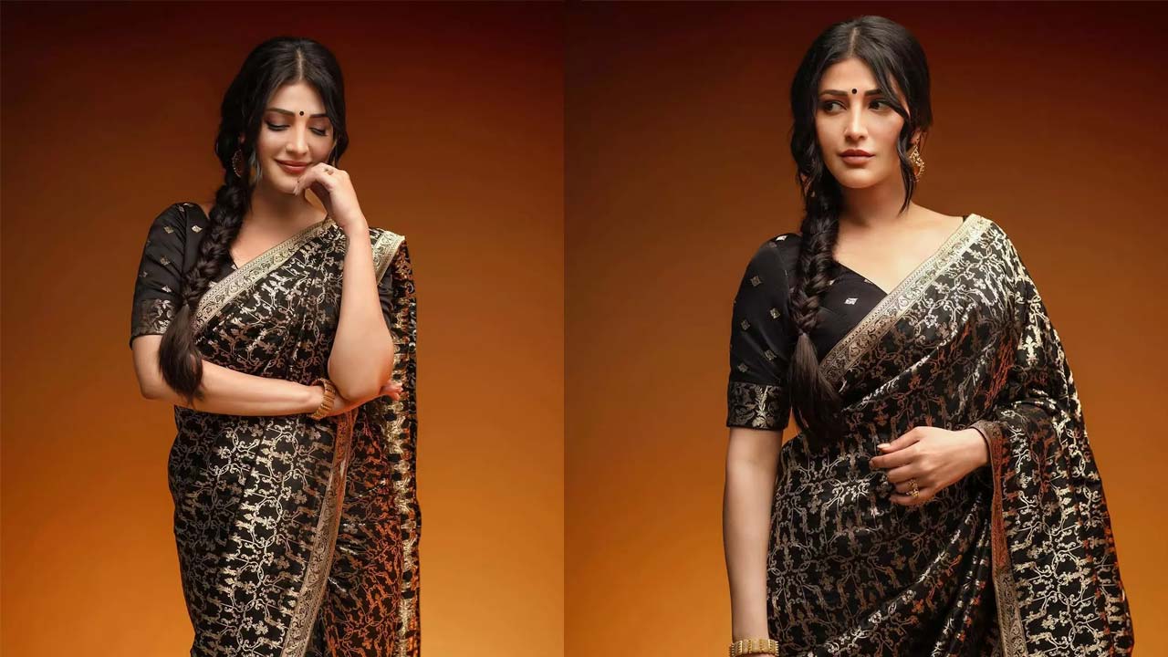 Shruti Haasan Stuns in a Sophisticated Black Saree Shruti Haasan Stuns in a Sophisticated Black Saree